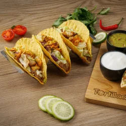 Taco- og hotdogholder i rustfrit st�l med br�t og sk�le