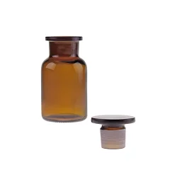 Apotekerglas med glaslg, brun glas 100ml.